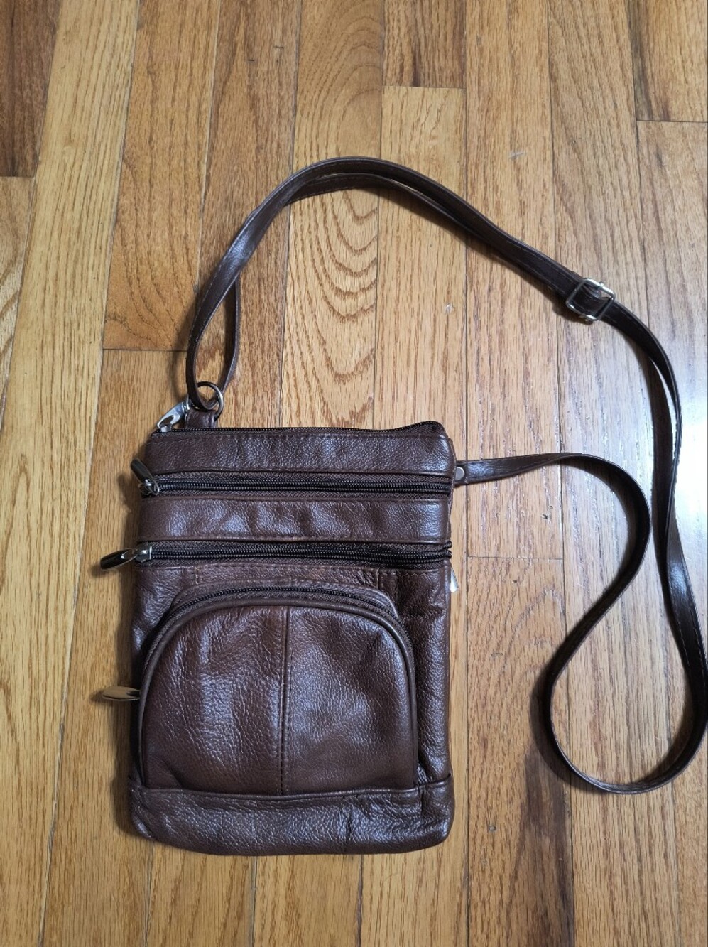 Brown leather or leather-like mini crossbody purse